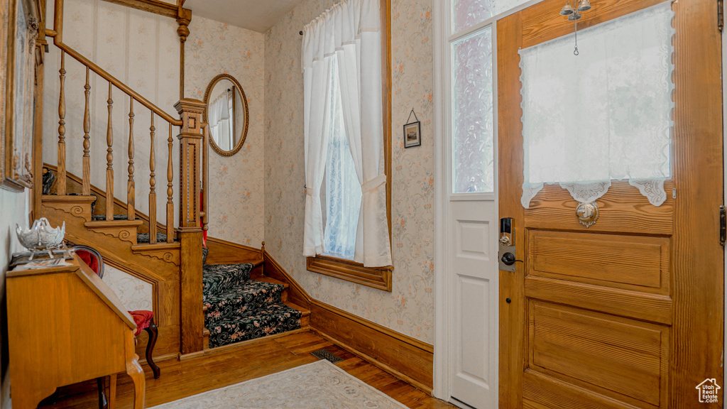 Foyer featuring hardwood / wood-style flooring