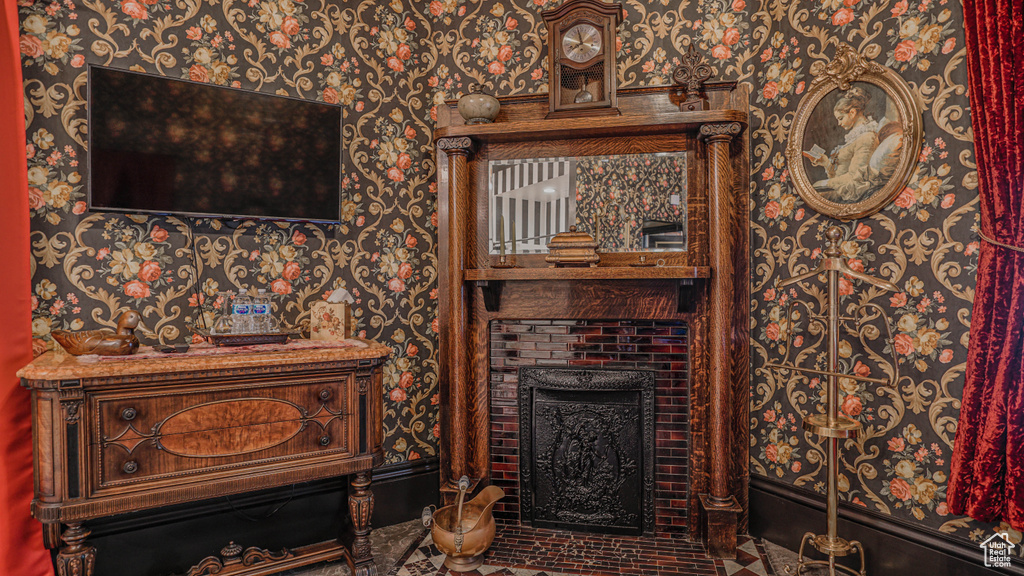 Interior space with a tile fireplace