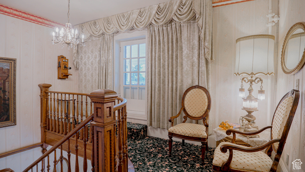 Living area featuring a chandelier