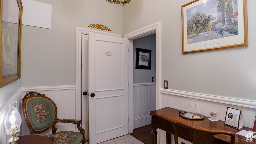 Entrance foyer featuring dark hardwood / wood-style floors