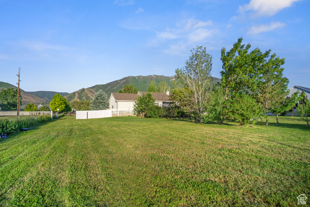 View of yard with a mountain view