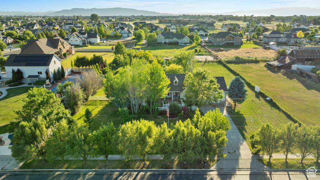 Birds eye view of property with a mountain view