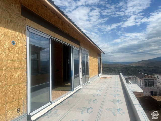 Balcony featuring a mountain view