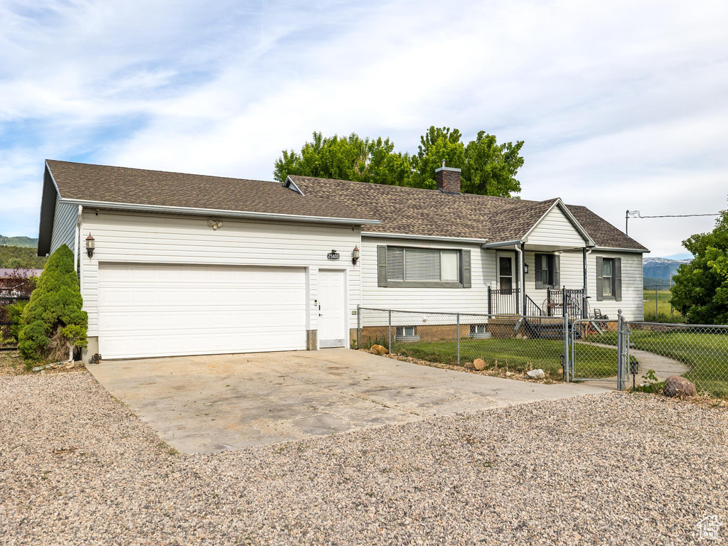 Single story home featuring a garage