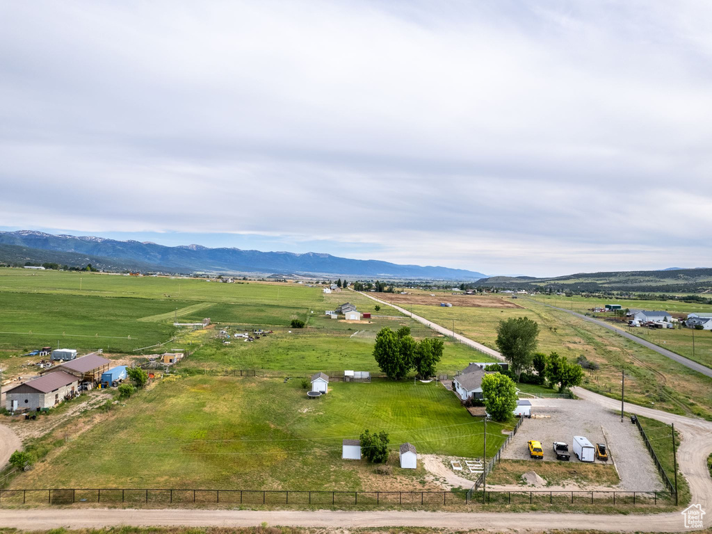 Drone / aerial view featuring a mountain view and a rural view