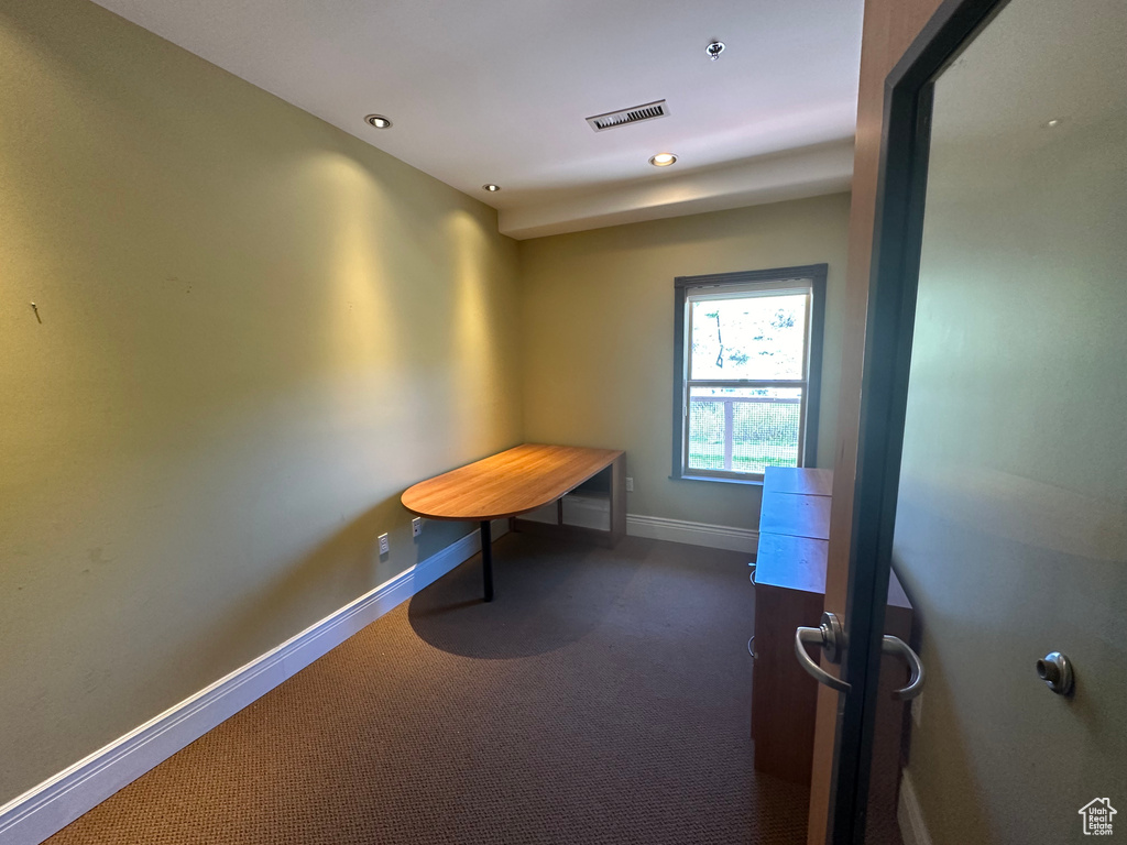 Interior space with dark colored carpet