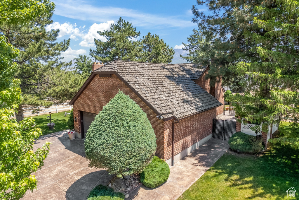 Exterior space featuring a front yard