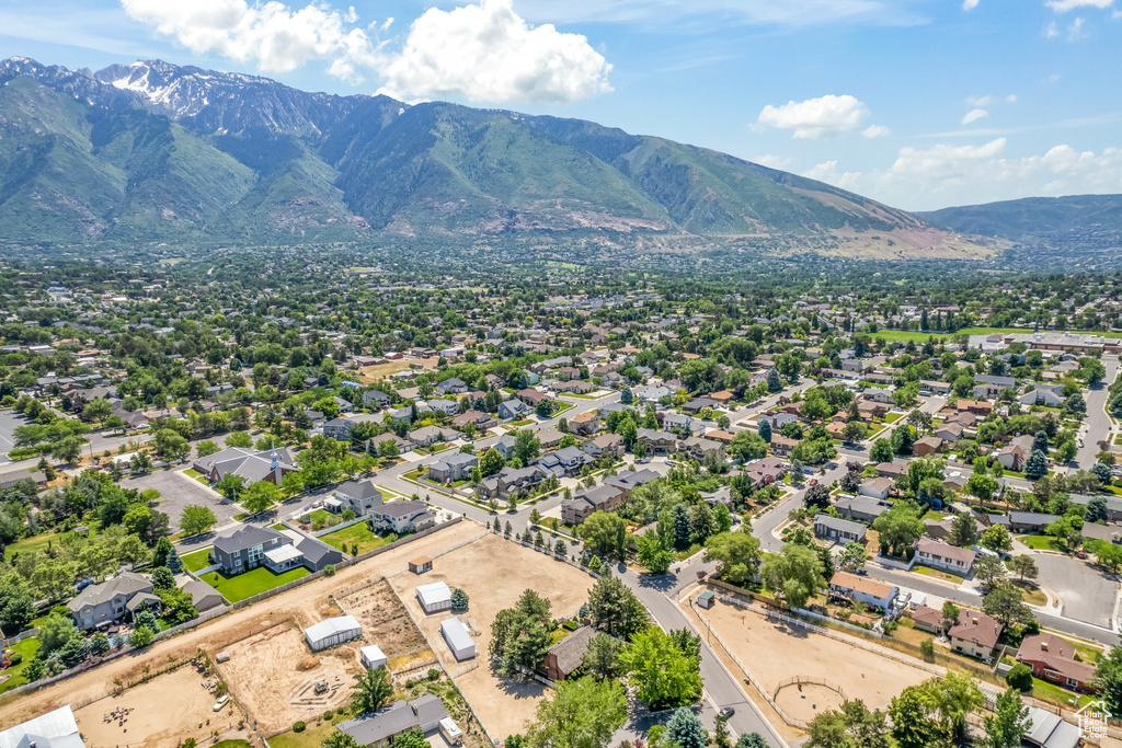 Birds eye view of property featuring a mountain view