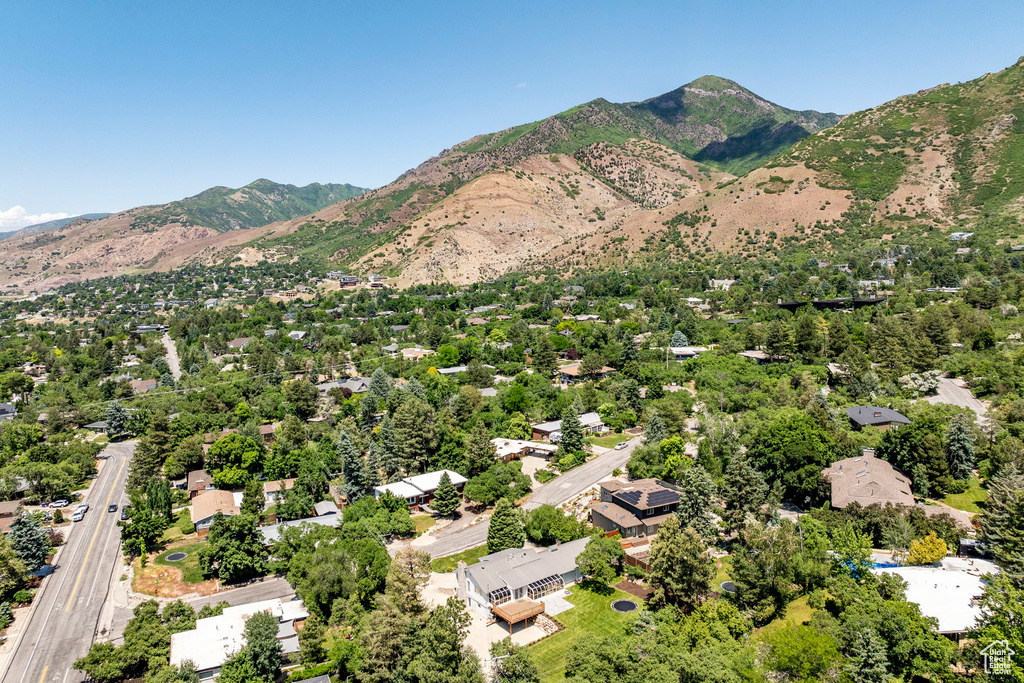 Birds eye view of property with a mountain view