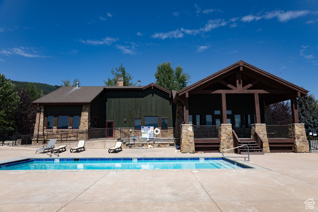 View of pool featuring a patio