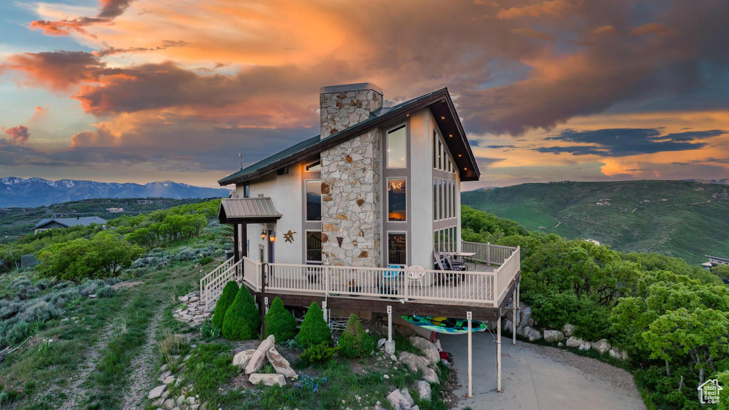 Exterior space featuring a mountain view