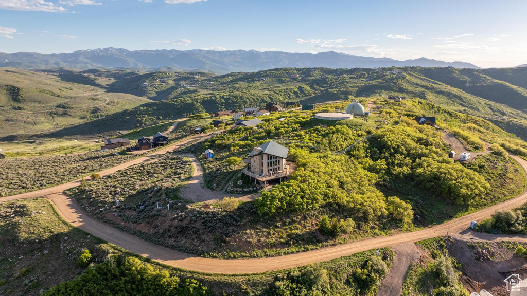 Birds eye view of property featuring a mountain view