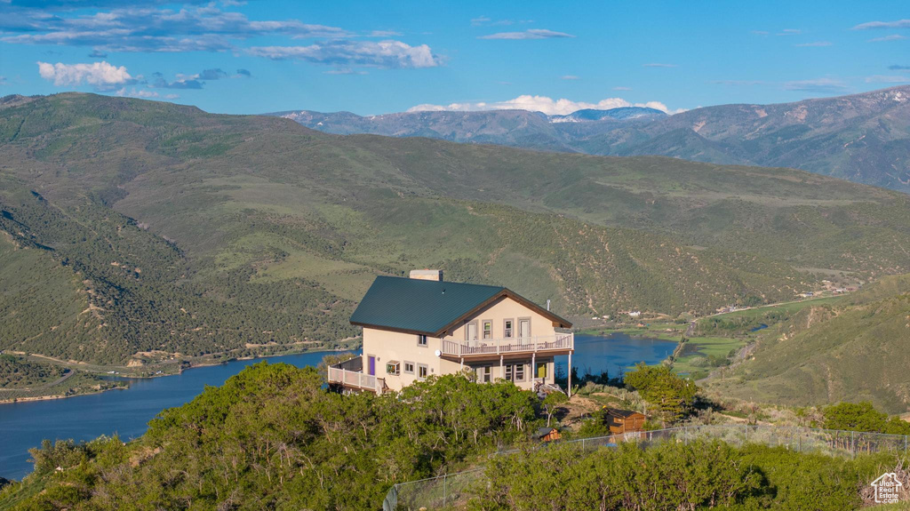 View of mountain feature with a water view