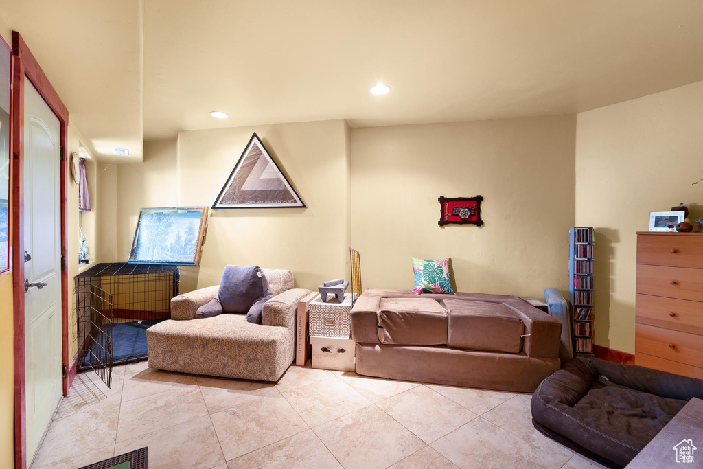 Living area featuring tile flooring