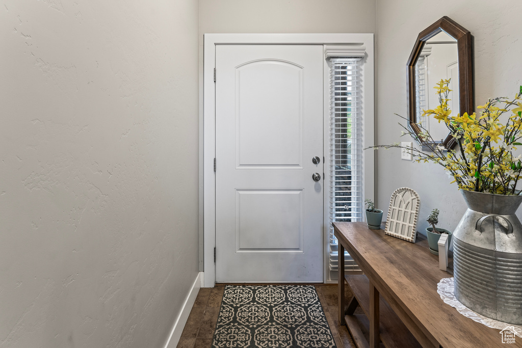 Doorway to outside with tile flooring