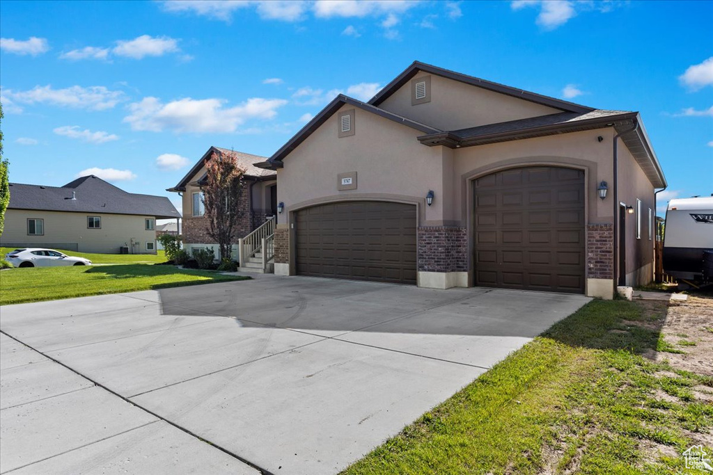 View of front of house with a front yard