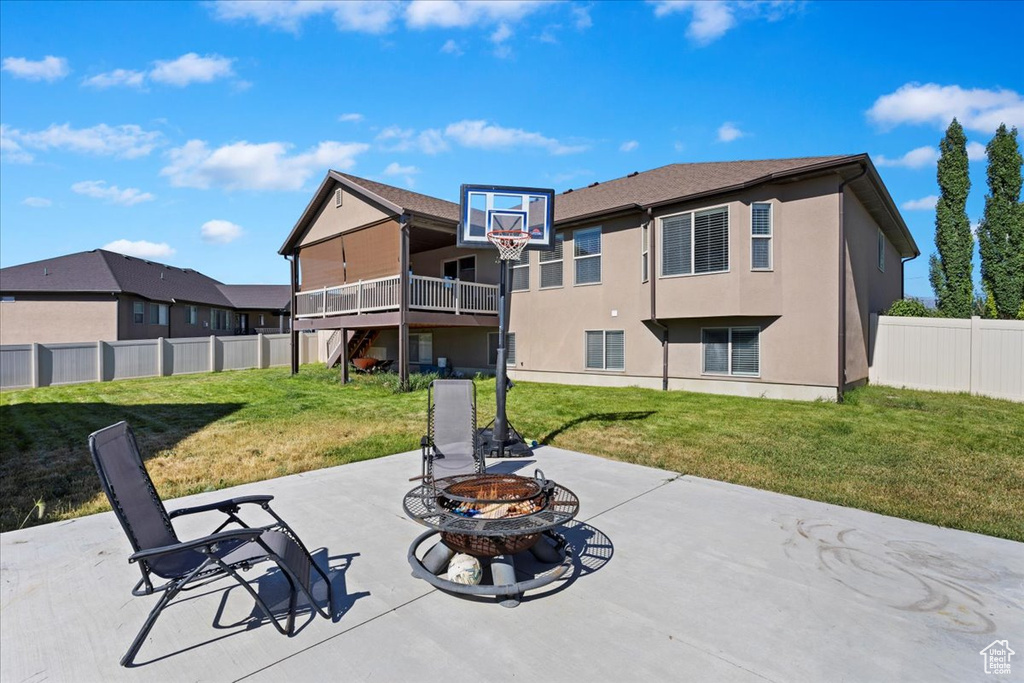 View of patio / terrace with an outdoor fire pit