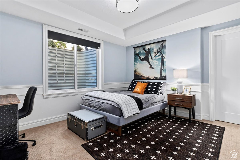 Bedroom featuring carpet