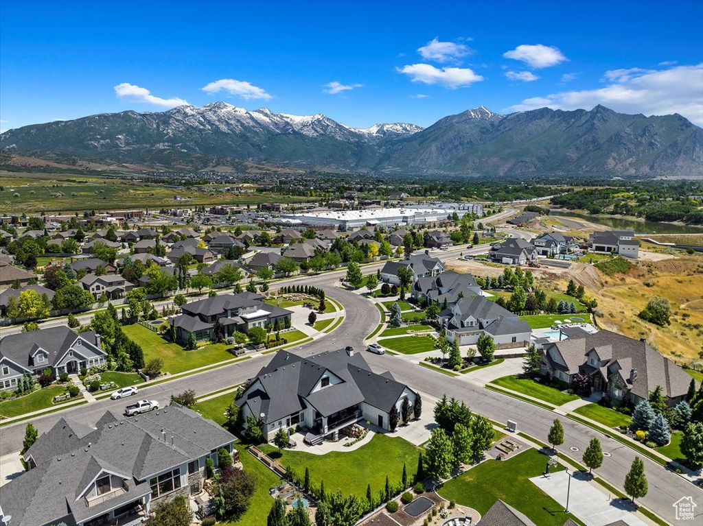 Birds eye view of property with a mountain view