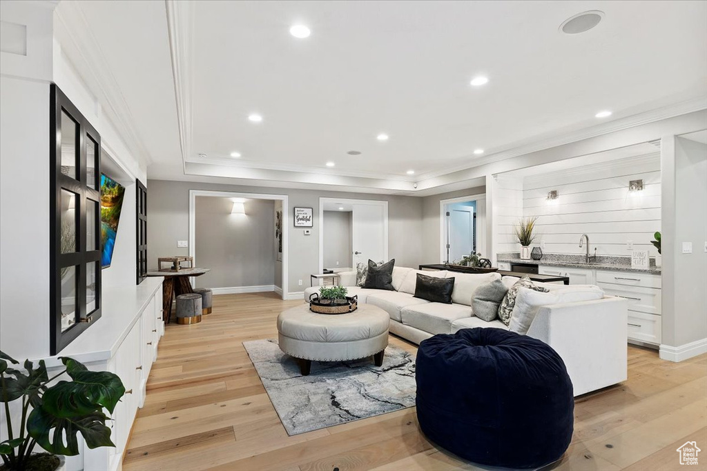 Living room with light hardwood / wood-style floors