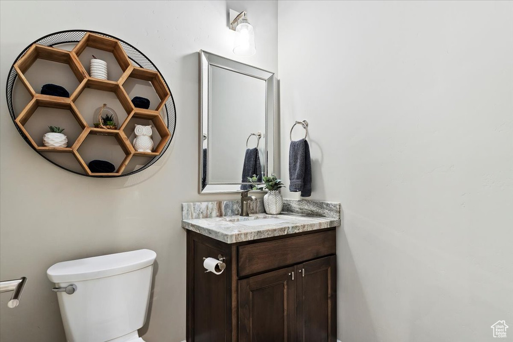 Bathroom featuring toilet and vanity