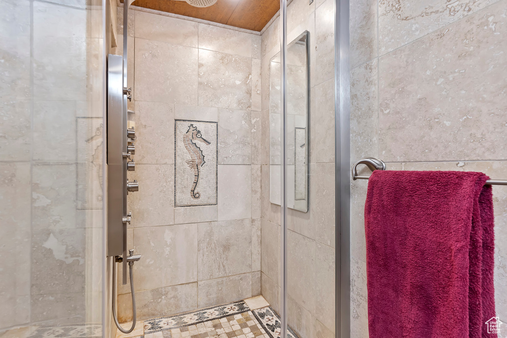 Bathroom with tiled shower