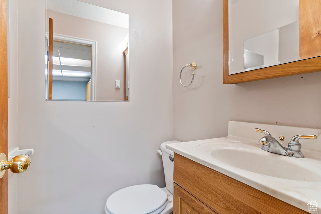 Bathroom with toilet and vanity