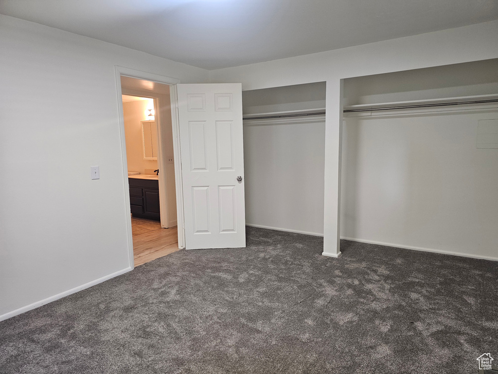 Unfurnished bedroom featuring carpet