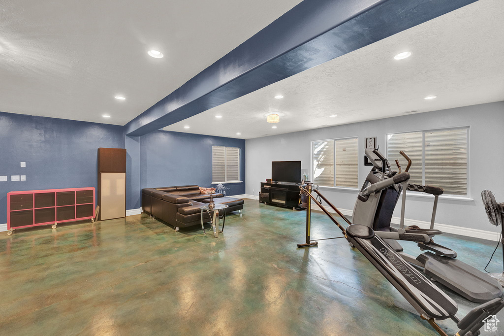 Workout area featuring concrete flooring