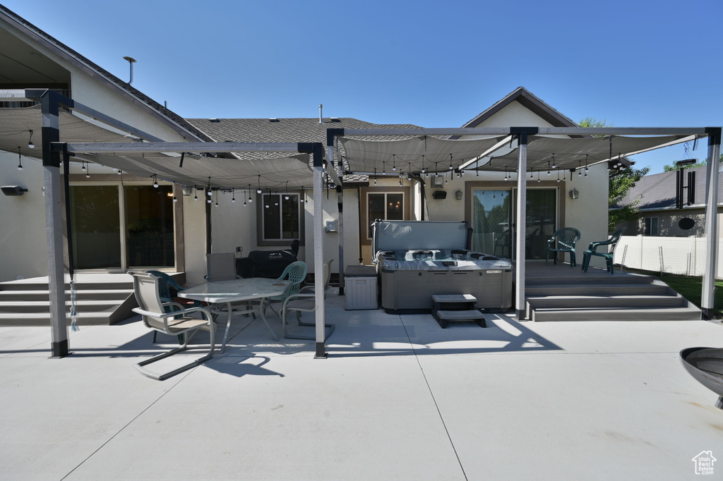 View of terrace with a hot tub