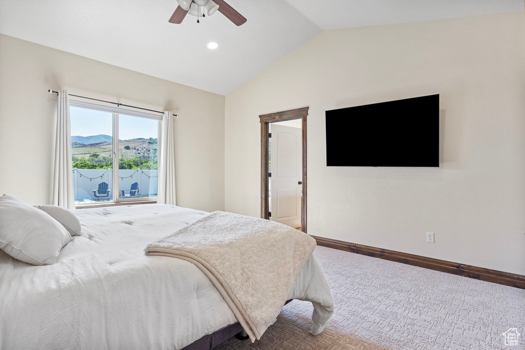 Bedroom featuring lofted ceiling and ceiling fan