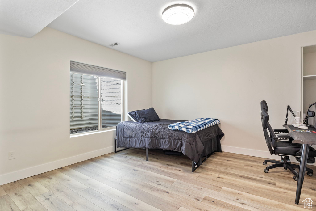 Bedroom featuring light hardwood / wood-style floors