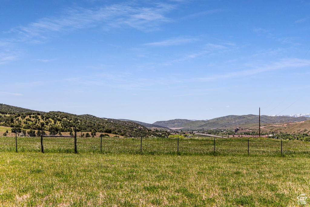 View of mountain feature with a rural view