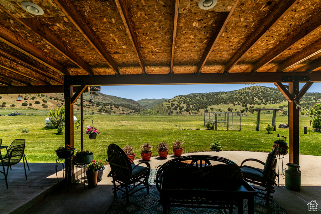 View of patio with a mountain view