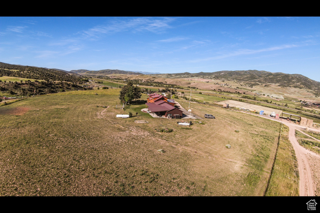 Birds eye view of property featuring a rural view and a mountain view