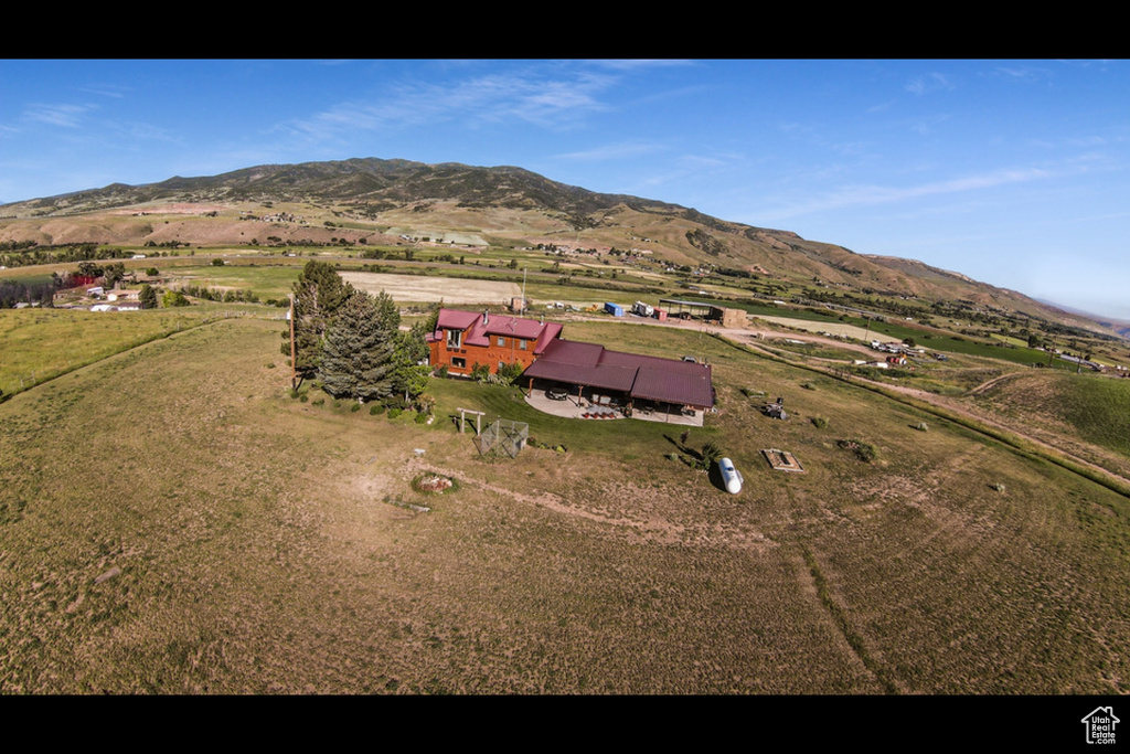 Birds eye view of property featuring a rural view and a mountain view