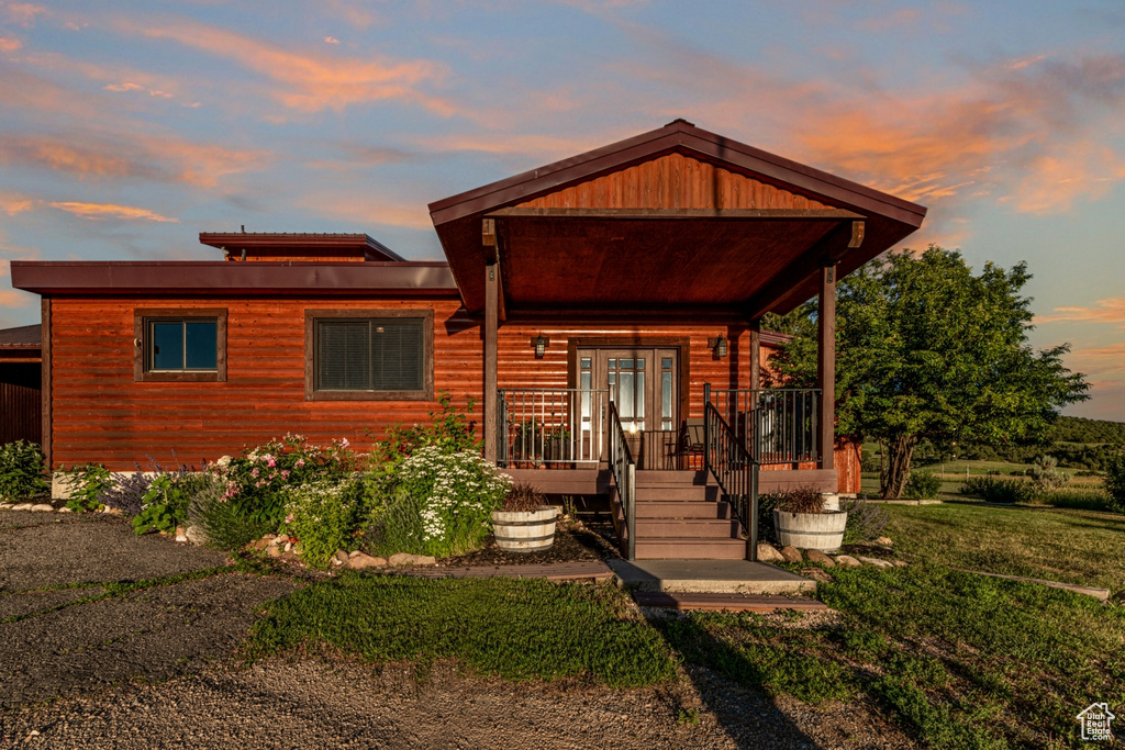 Log cabin with a yard