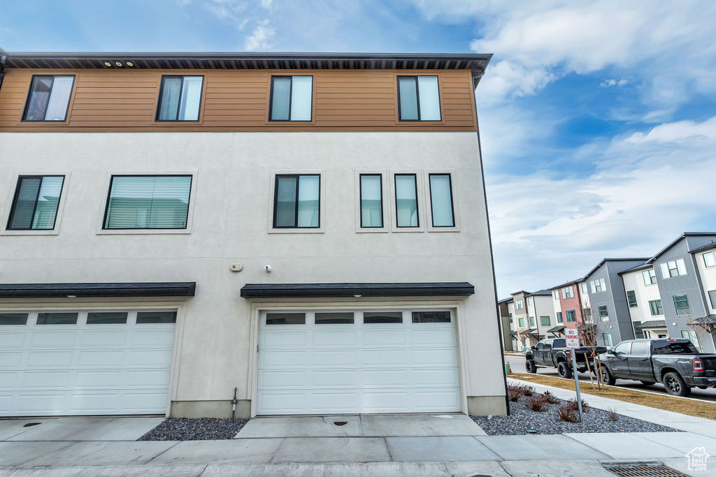 View of front of house with a garage