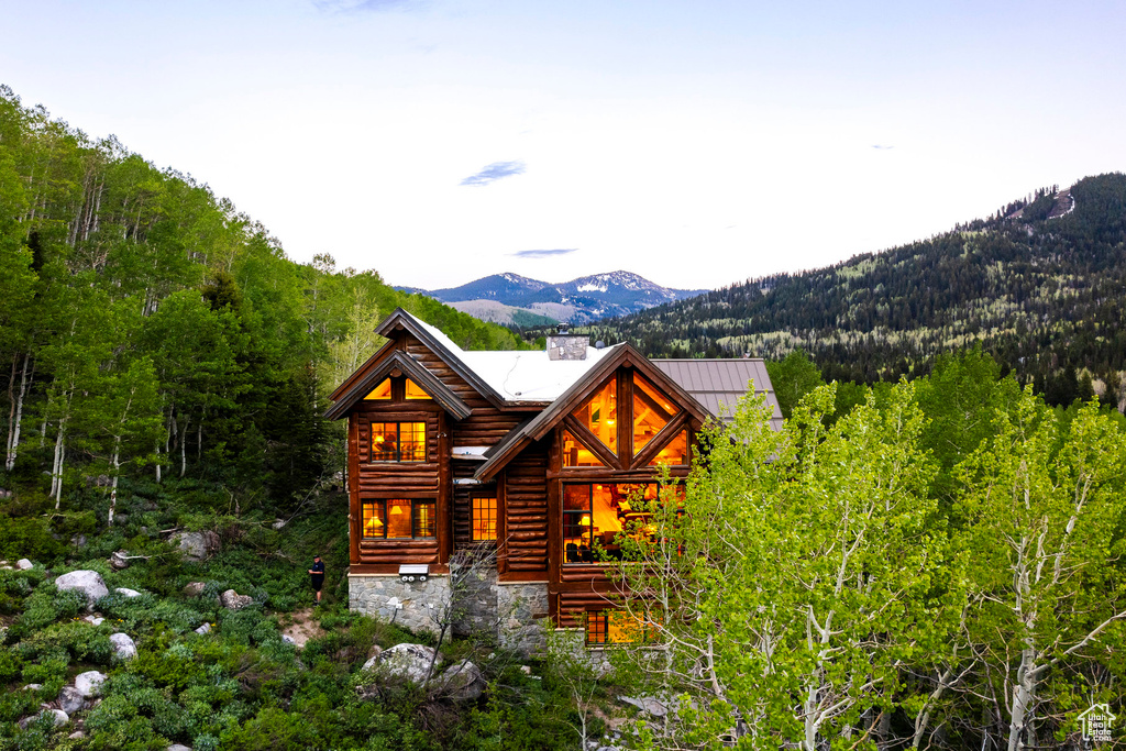 View of front of house featuring a mountain view