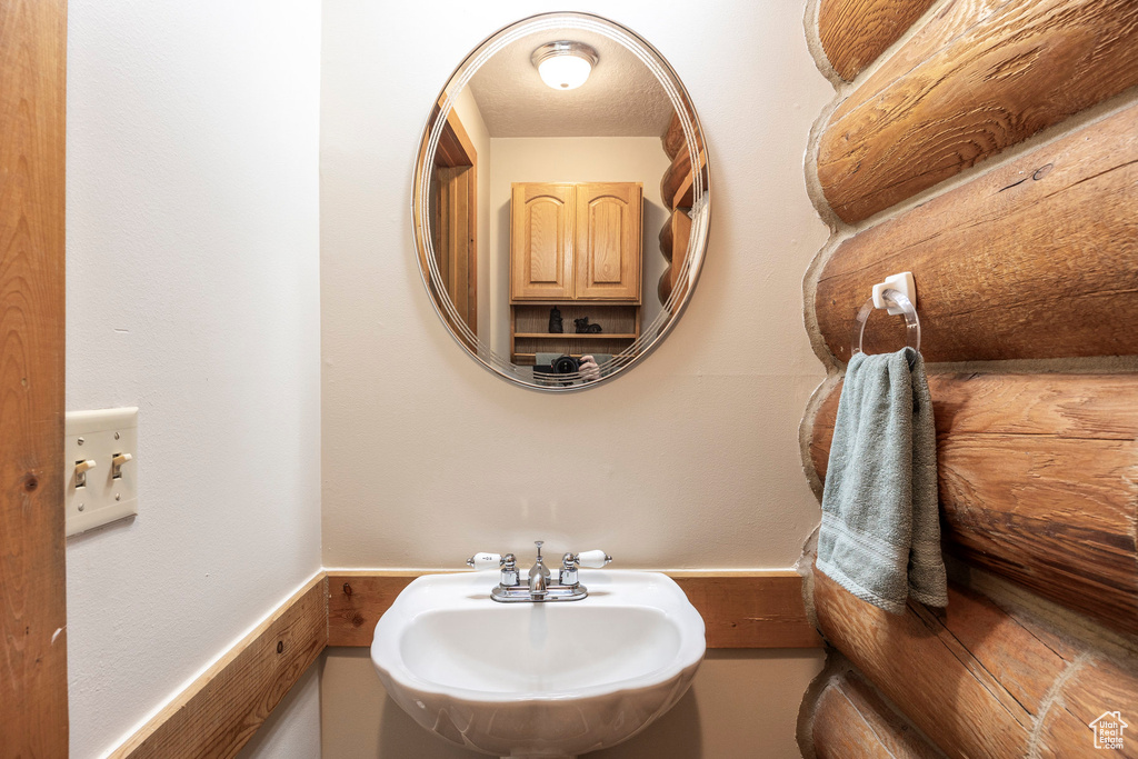 Bathroom featuring a sink