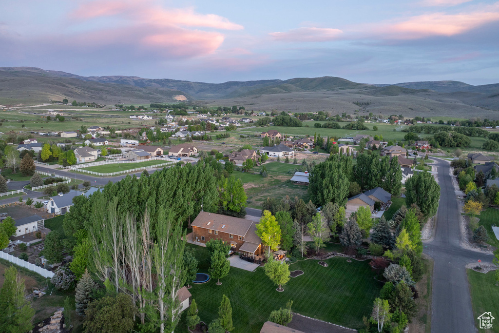 Aerial view at dusk of a mountain view and a residential view
