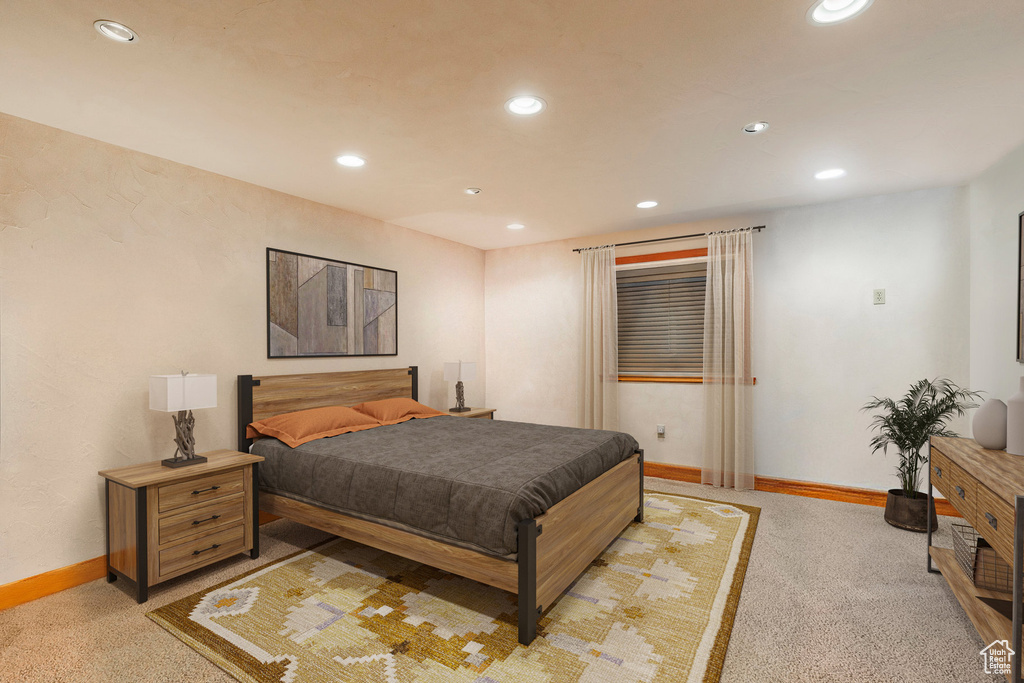 Bedroom featuring light colored carpet, recessed lighting, and baseboards