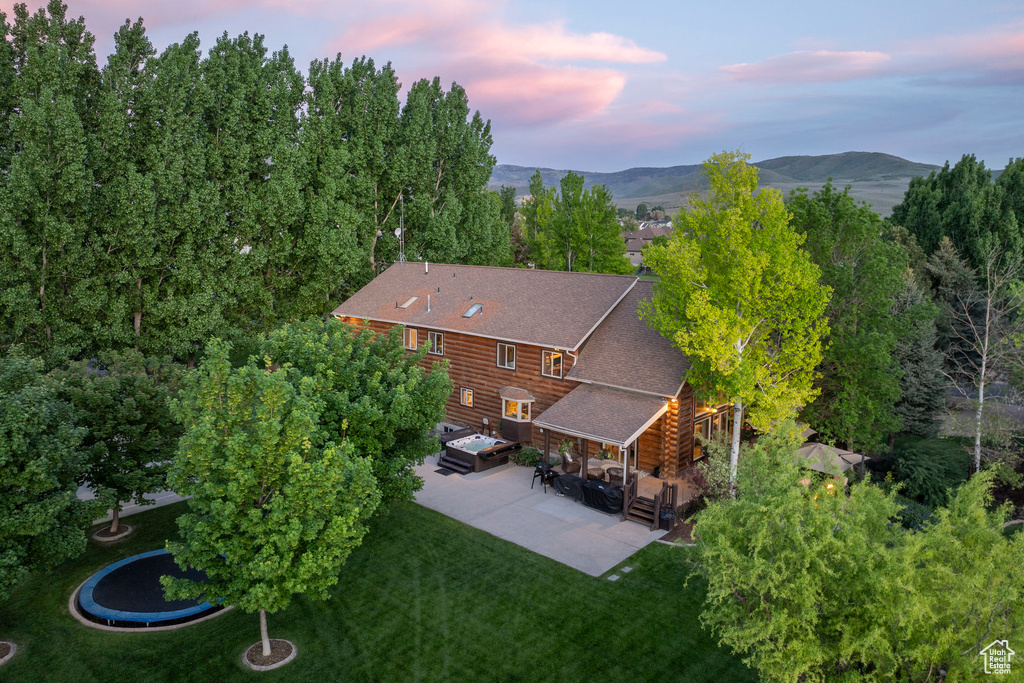 View from above of property featuring a mountainous background