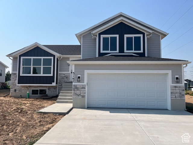 View of front of property with a garage