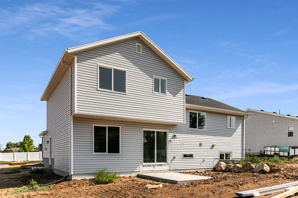 Back of property featuring a patio area