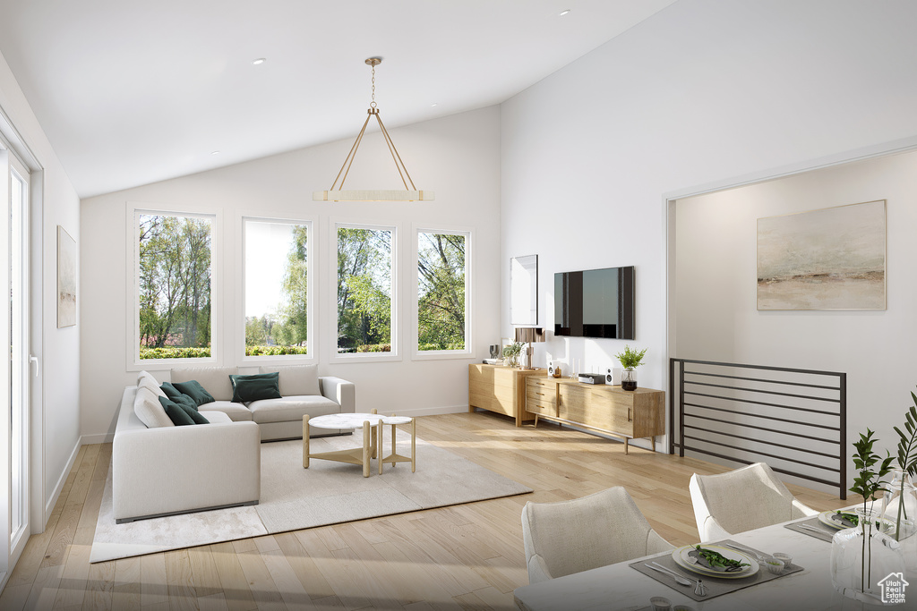 Living room with high vaulted ceiling, a wealth of natural light, and wood-type flooring