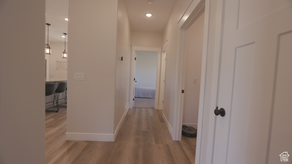 Hall with wood-type flooring