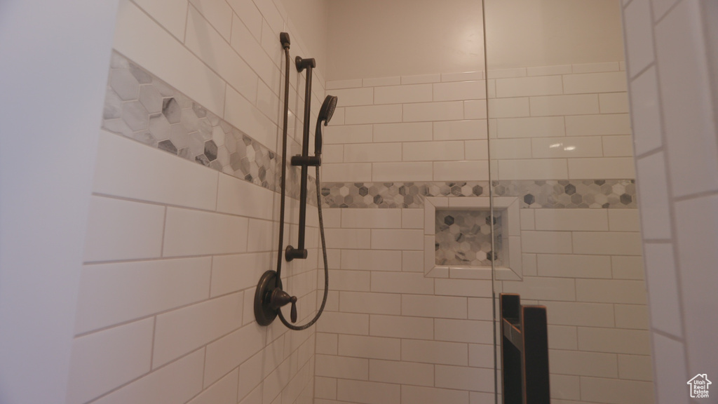 Details featuring tiled shower