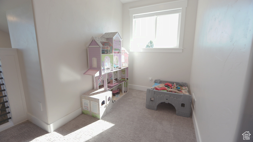 Playroom featuring carpet