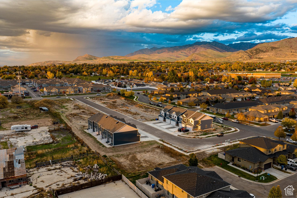 Birds eye view of property with a mountain view